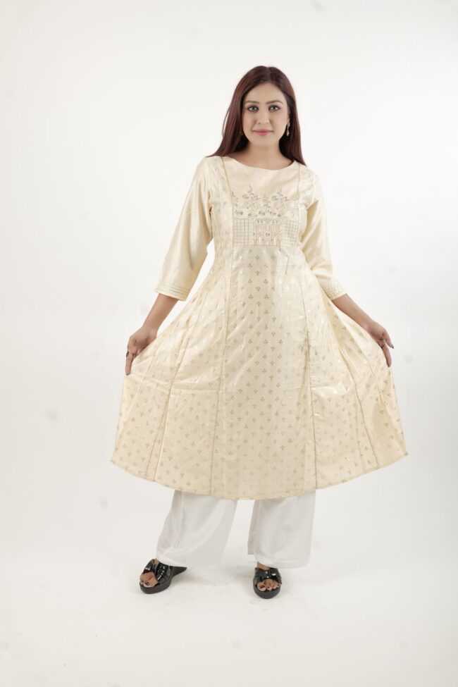 Women Cream Embroidered Kurta With A Line Hemline Detailing